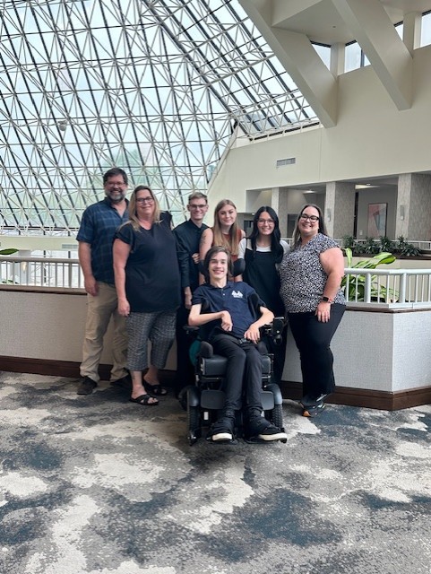 My Voice Group members dressed in black standing together for a picture