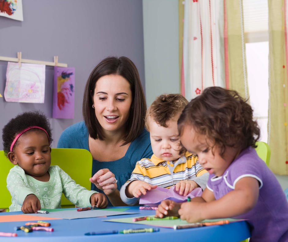 Teacher in a classroom with young children